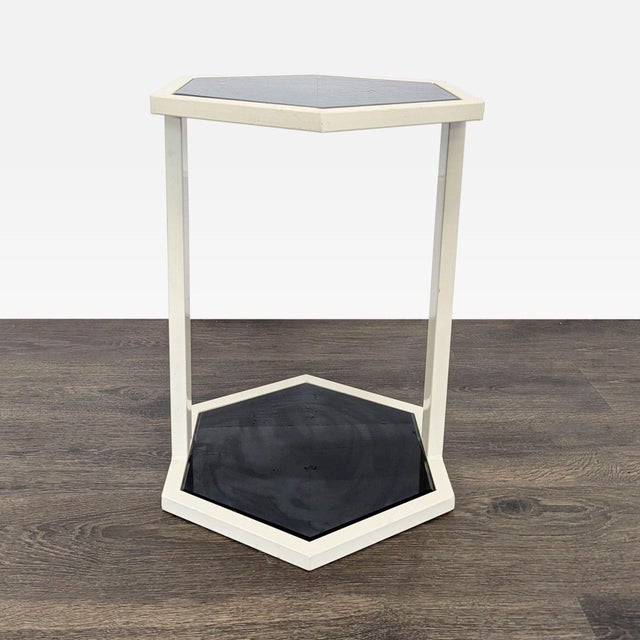 White metal frame with black glass top and base. Brand: Nate Berkus. No maker's label visible. Dimensions (in): 16W x 16D...