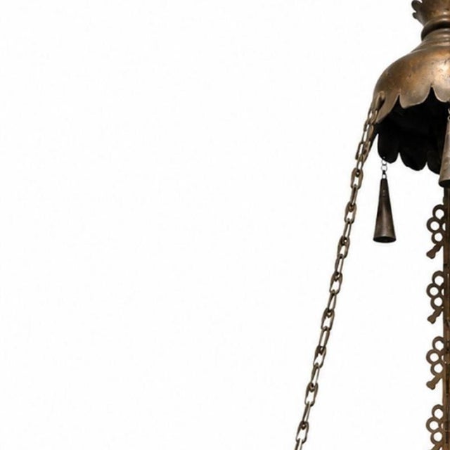Lighting - Hanging lantern - 18th century (110 cm). Portuguese, 18th century; in brass decorated with three mascarons....