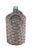 An early 20th-century green glass wine bottle/ demijohn or carboy, fully wrapped in woven wicker with handles. No cork....