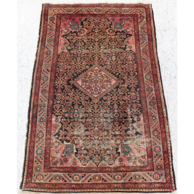 Luscious background in blue, highlighted with central medallion. Wool pile on cotton foundation. Circa 1930 4'4"x 6'7"