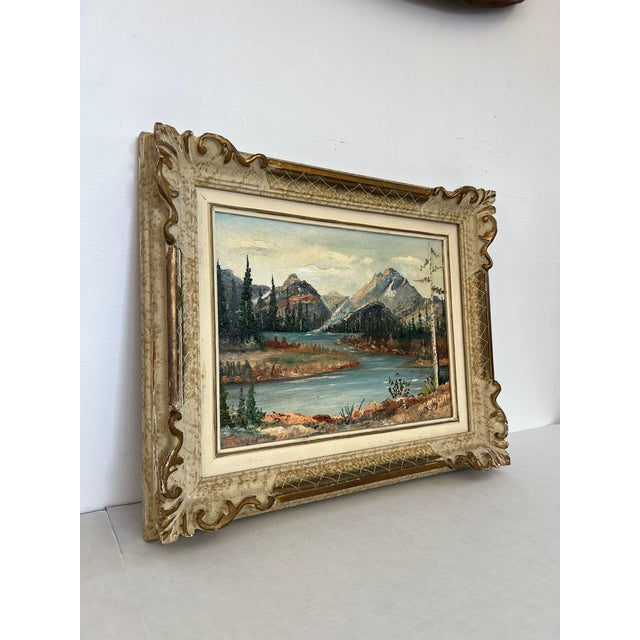 This Vintage mountain river landscape framed painting is dated 1971 and signed by F.D.Lessley. It was painted in Jackson...