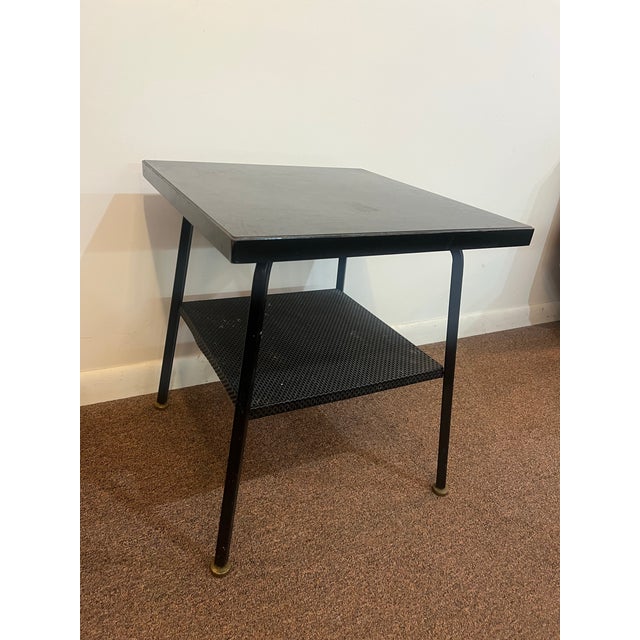 Simmons black metal side table Mid-century modern This has been used and well loved It has some remnants of white speckles...