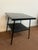 Simmons black metal side table Mid-century modern This has been used and well loved It has some remnants of white speckles...