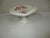 A handcrafted white ceramic pedestal bowl. This twisted woven rope basket design bowl has hand painted applied pink roses...