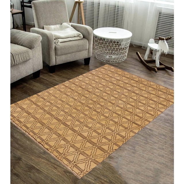 This stunning hand-knotted Afghan Balouchi rug is a captivating addition to any decor. Crafted by skilled artisans, it...