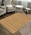 This stunning hand-knotted Afghan Balouchi rug is a captivating addition to any decor. Crafted by skilled artisans, it...