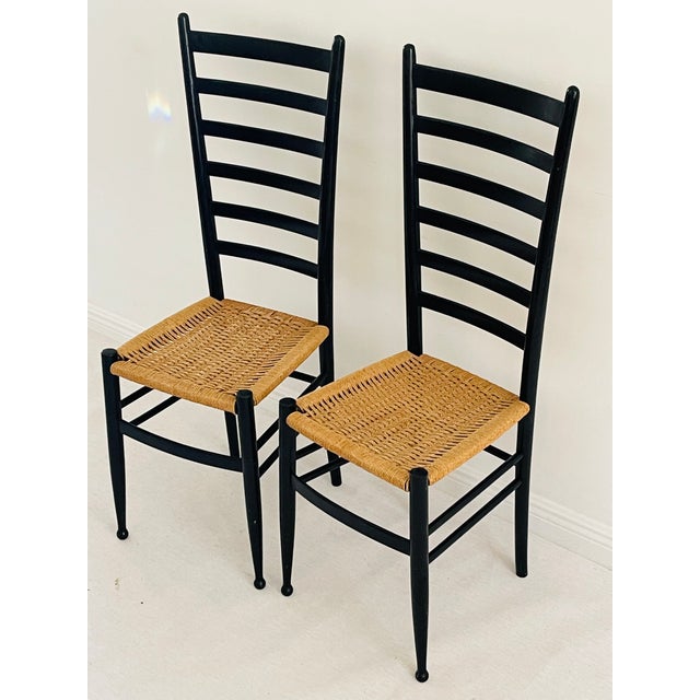 Mid century modern Italian Paolo Bufa style pair of chairs , ebonised wood with rush seats, high ladder backs. Elegant...