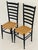 Mid century modern Italian Paolo Bufa style pair of chairs , ebonised wood with rush seats, high ladder backs. Elegant...