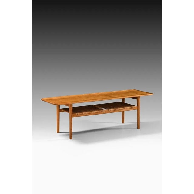 Coffee table in oak and woven cane by hans wegner, 1950's additional information: material: oak and woven cane style: mid...