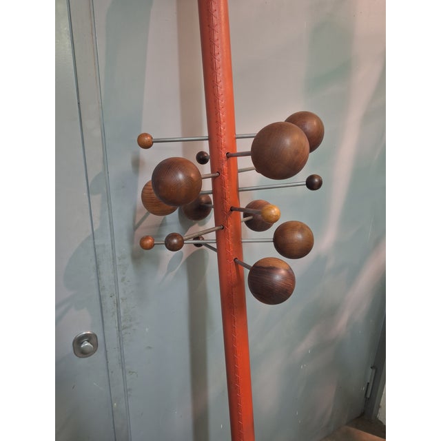 Model AT16 Floor-to-Ceiling Coat Hanger in Red Leather by Osvaldo Borsani for Tecno, 1960s, in Very Good conditions....