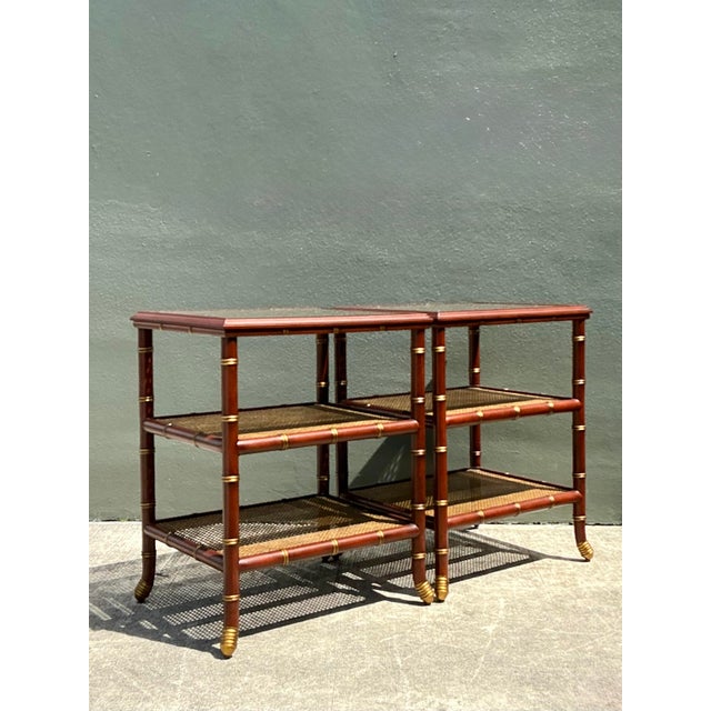 Elevate your interior with this exceptional pair of vintage Hollywood Regency side tables, featuring a sophisticated and...