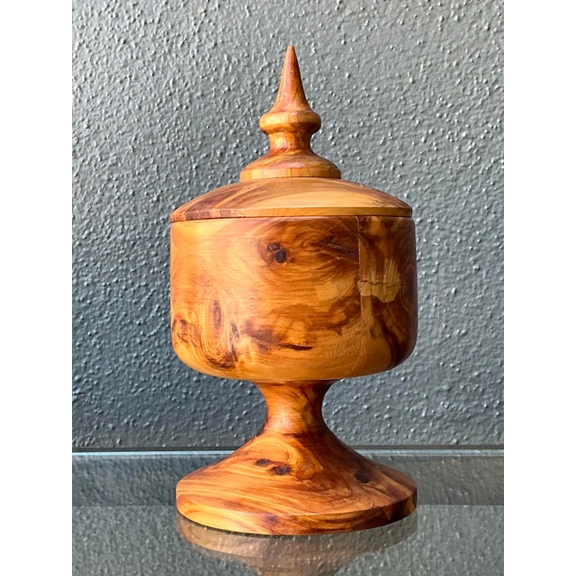 This elegant vintage hand-turned wood lidded box is a beautiful example of mid-century studio craft. Expertly turned on a...