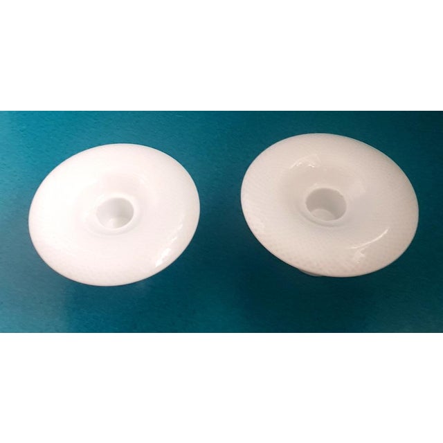 Rosenthal Candle holders designed by Tapio Wirkkala. On the top there is a radiating pattern of impressed dots that...