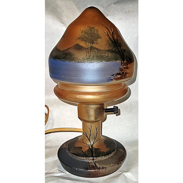 Charming reverse-painted frosted glass boudoir table lamp with winter cabin the woods motif, glass shade and glass base...