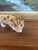 This vintage porcelain leopard figurine was produced by Erphila in Germany, known for its fine ceramic craftsmanship...