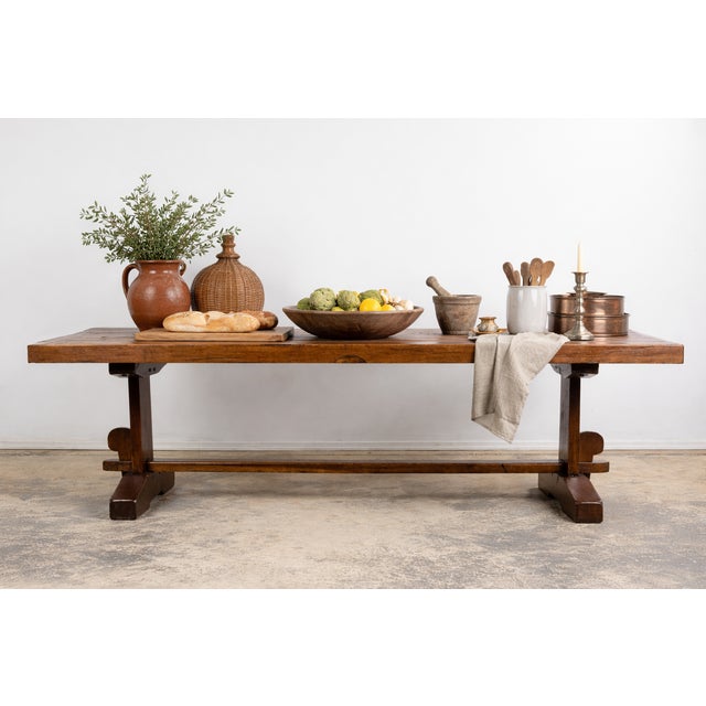 A substantial French refectory table dating to the late 18th–early 19th century, sourced from the south of France in the...