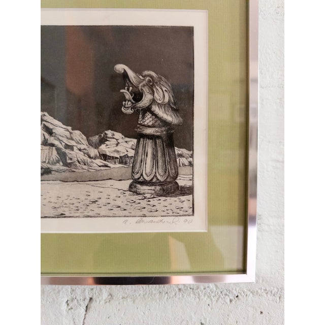 Surrealist style ink drawing with green matting and a silver frame. This has been professionally framed. Ink drawing was...