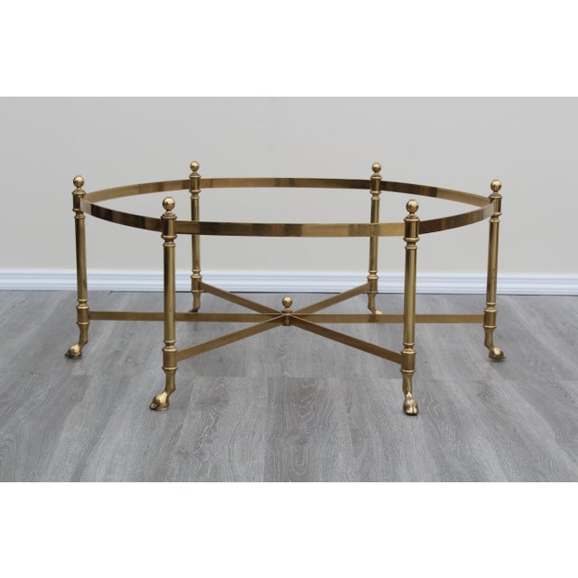 Late 20th century La Barge Style Brass coffee table with glass top This table has minor wear and overall is great vintage...