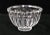 A Late 20th Century decorative crystal bowl. Clear thick crystal round bowl with a narrow solid rim with cut ovals beneath...