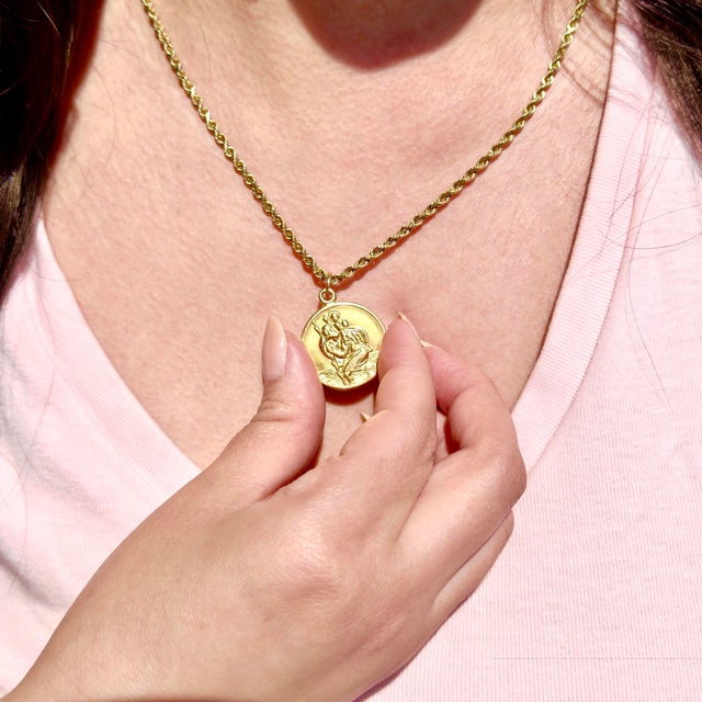 About This Pendant: A timeless piece of Italian craftsmanship circa 1970s, this 18K Saint Christopher medallion carries...