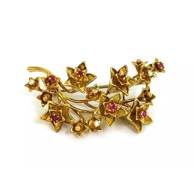 This vintage authentic brooch is from Tiffany & Co. crafted from 18k yellow gold with a polished finish. It features a...