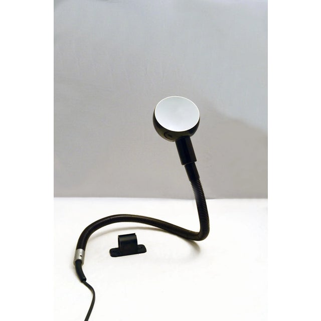 - Model Hebi table or wall lamp in dark brown - Designed by Isao Hosoe for Valenti around 1970 - Flexible body in metal...