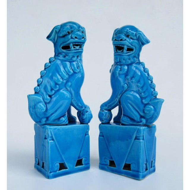 Vintage; C.1970's-80's Set of ceramic glazed, peacock blue to an intense and vibrant cerulean blue coloration of this pair...