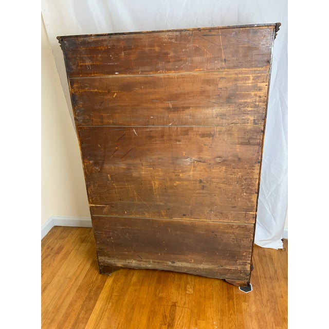 A nice Chippendale Pine tall chest in an old refinished surface. Nicely dovetailed top and case joints with six cock...
