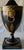 The bowl showcases a hand-painted brown geometric pattern over a speckled beige background, typical of MCM (Mid-Century...