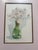 Beautiful original watercolor by Nancy Martin featuring a soft, airy floral arrangement in a translucent green glass vase....