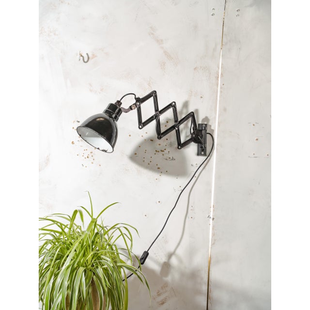 Black Scissor Lamp from Elektroinstala Decín, 1950s, in Good conditions. Designed 1950 to 1959 This piece has an...