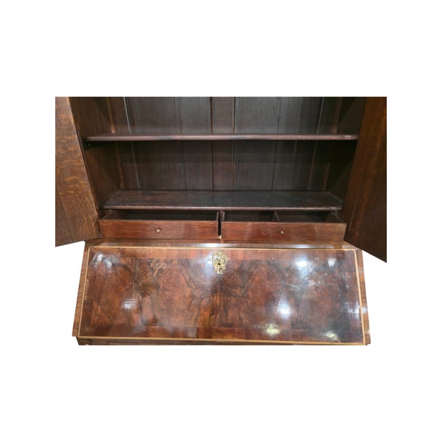 A masterful bureau cabinet / secretary made in Copenhagen around 1745, constructed in walnut. The tall piece is crowned by...