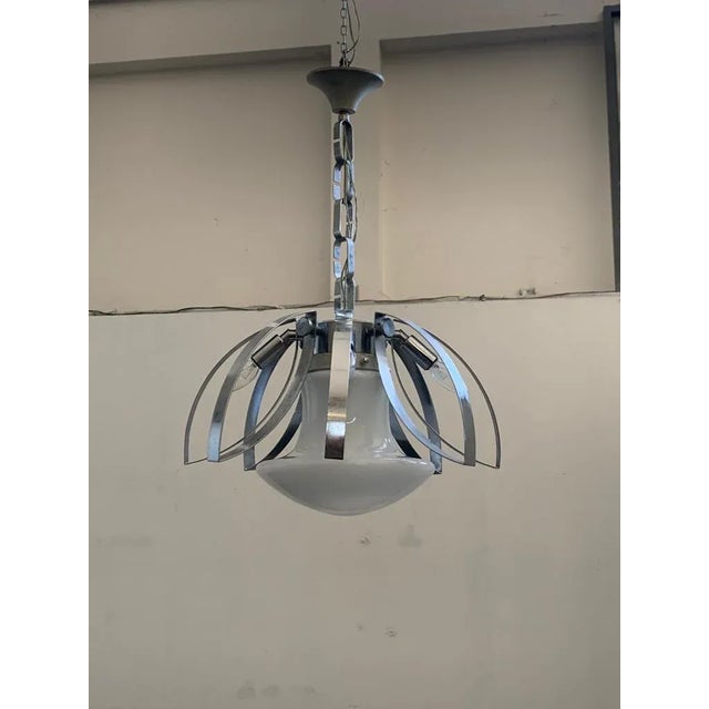 Exceptional space age interpretation for this lamp, lit to the effect of an anthropomorphic element suspended in space....