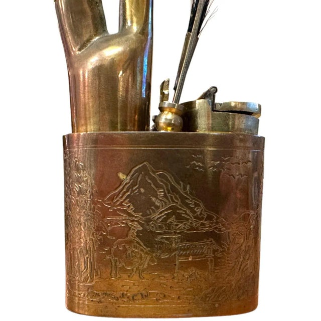 Vintage Chinese water pipe with associated tools and accoutrements. Etched brass construction. The age is estimated to be...