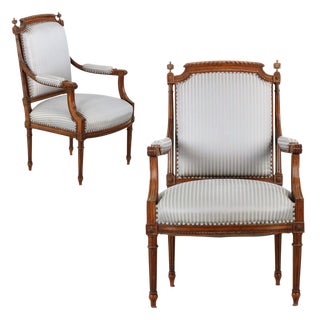 Louis XVI Style Carved Walnut Arm Chairs- A Pair For Sale