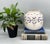 Stunning vintage pottery vessel by Arauco Antiqua of Chile, featuring a beautifully detailed hand-painted floral and...
