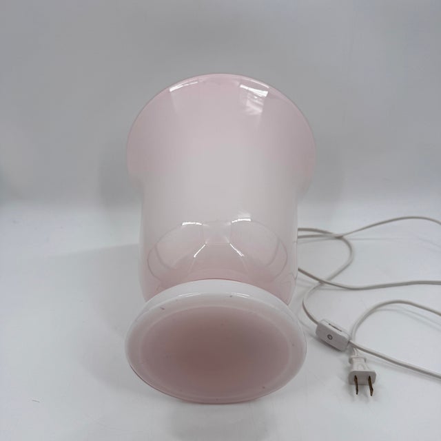 Elegant vintage French tulip-form table lamp in pale pink cased opaline glass with a white interior. The softly flared...