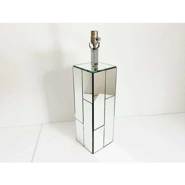 Massive, magnificent Hollywood Regency statement lamp from the 1970s with a rectangular mirror tiled wood column base...