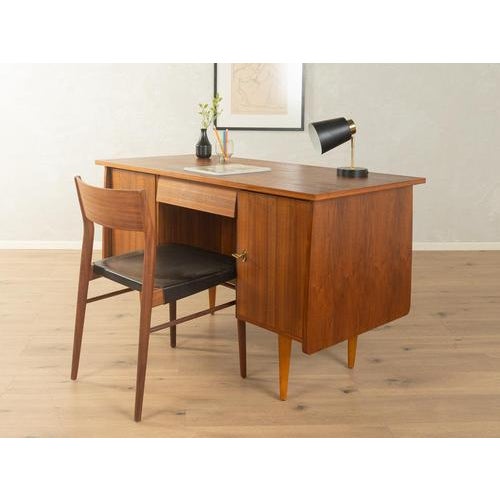 1950s Desk Very good workmanshipHigh-quality materialstongue-and-groove solid wood drawersMade in Germany Table Underside:...