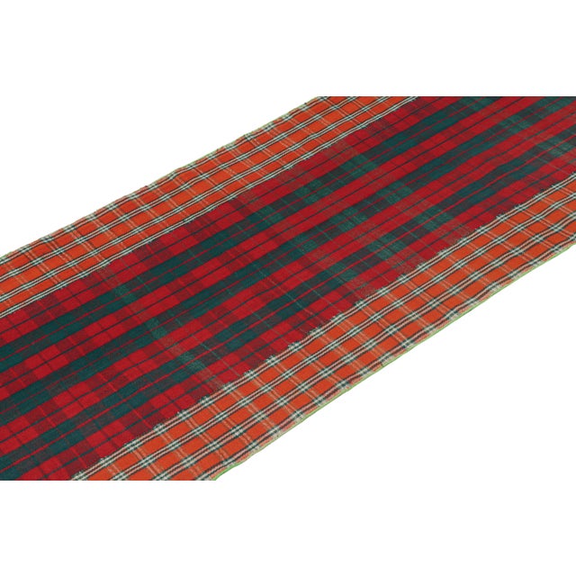 This vintage 3x15 Persian kilim is a rare extra-long runner from the Qashqai tribe, handwoven in wool circa 1950-1960. Its...