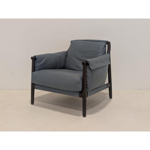 Condition: excellent brand: poltrona frau model: times colour: petrol blue material: leather & wood measurements: 90cm w x...