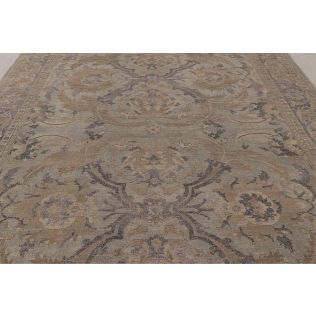 Hand-knotted in a luxurious blend of wool, linen and luminous silk, this captivating 8x12 rug from Rug & Kilim is a...