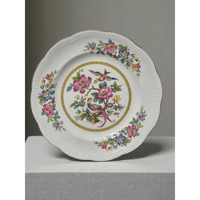 This vintage Chinoiserie Crown Clarence Staffordshire England Oriental Bird Plate is a unique collector's item featuring...