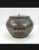 A glazed mizusashi or water vessel used for tea ceremonies in Japan. Likely created in SE Asia, this item was exported to...