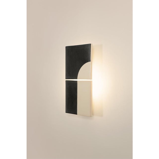 Tile(s) is a collection of wall lights produced in collaboration with ceramic tiles designer Marianne Smink. They provide...