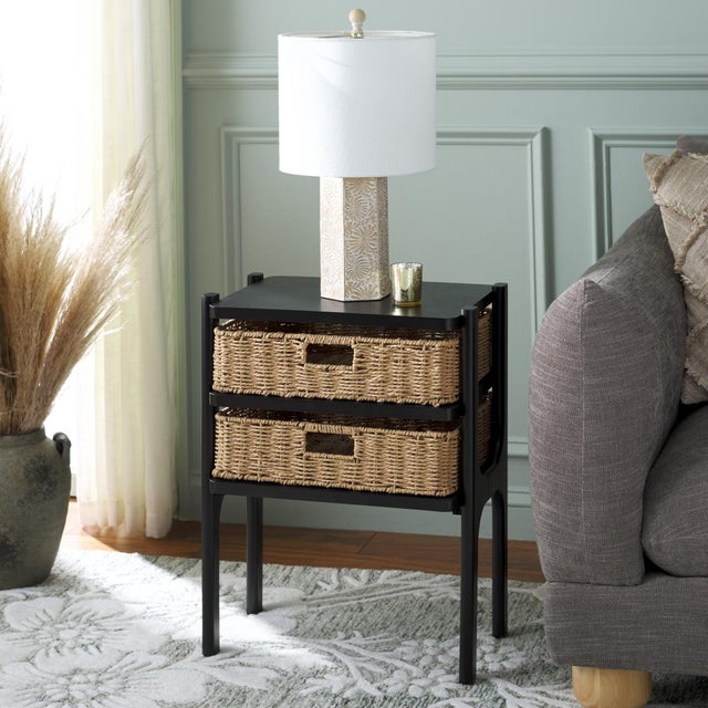 Introducing the Rozalyn Two Drawer Accent Table in a sophisticated matt black hue. This elegantly designed piece offers...