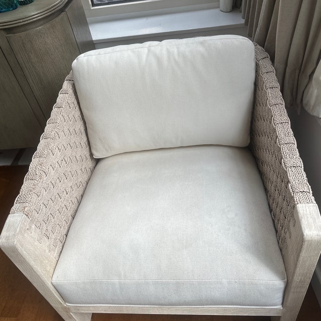PULLMAN LOUNGE CHAIR 7953-03 Cerused hardwood frame featuring a double wall back and sides of hand- twisted and woven...