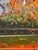This is a gorgeous painting. Deep woods, falling trees and still rivers reflecting Autumn in all its glory. Photographs do...