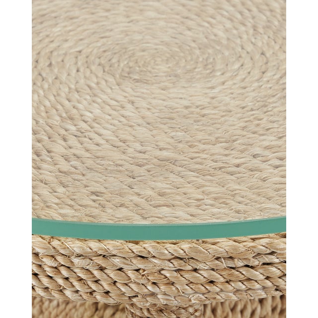 The wrought iron and wood frame of the Limay Rope Accent Table is wrapped in natural abaca rope. The precision with which...