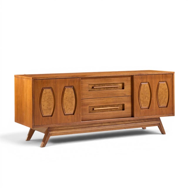 Young Manufacturing Mid Century Walnut and Burlwood Credenza and Hutch The credenza measures: 64 wide x 19 deep x 26.25...